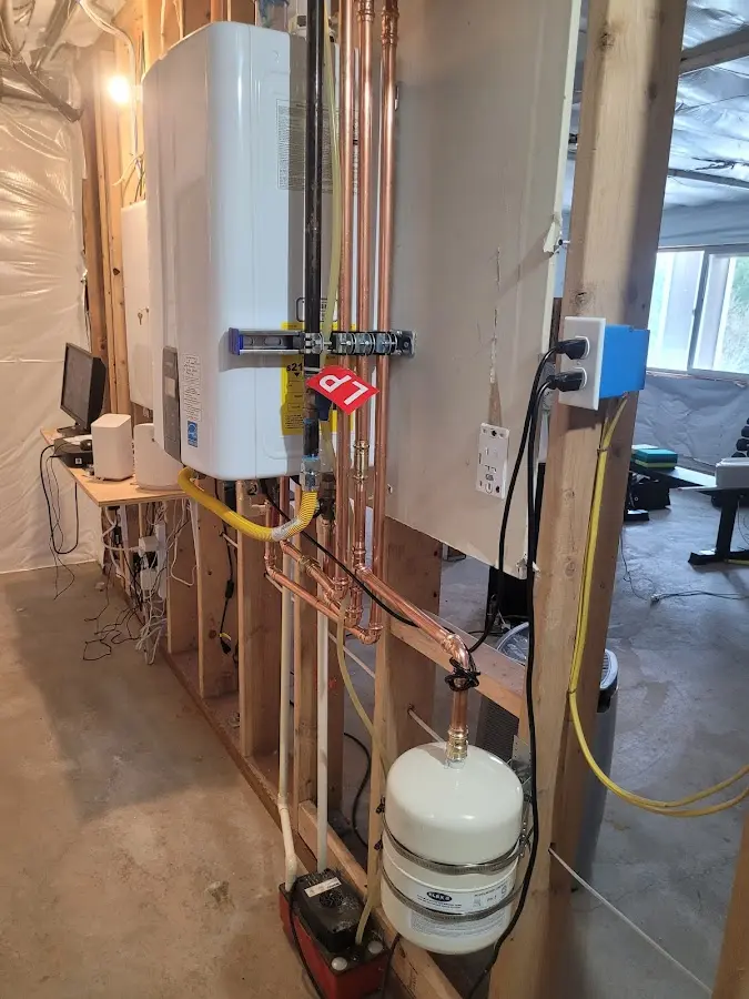 Licensed plumber repairing a kitchen sink in Destin